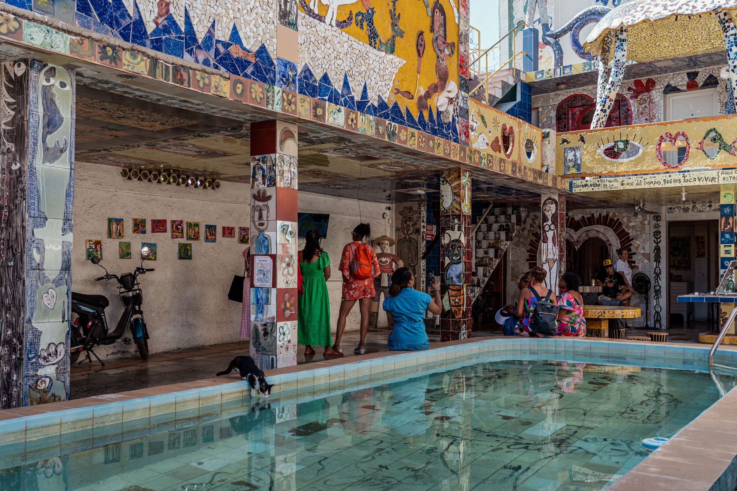 The mosaic-tiled pool patio at Fuster's house, columns and walls covered in tile